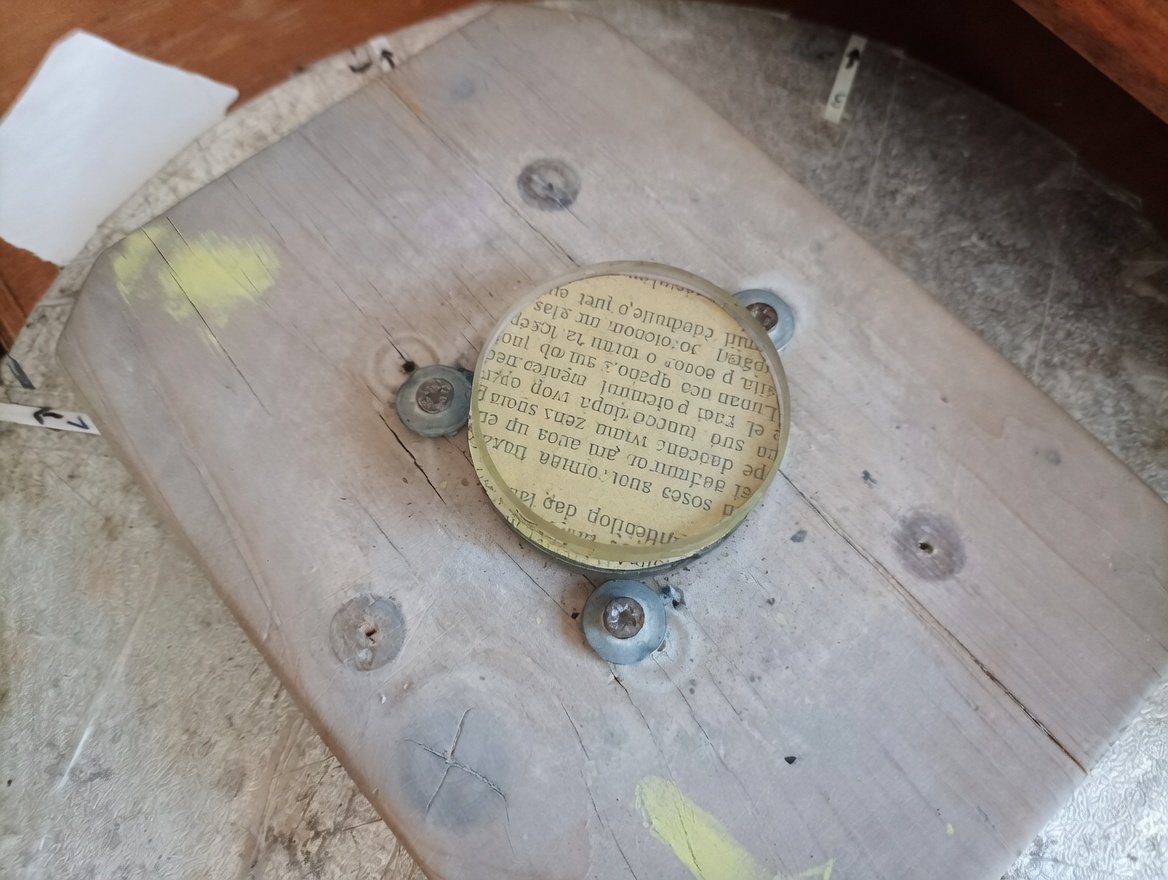 Plano convex lens Tripoli paper polishing.jpg