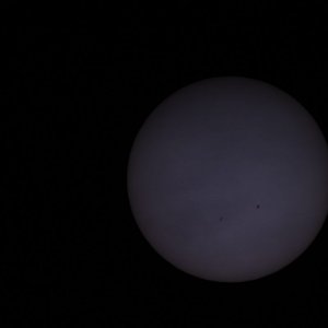 Sonne hinter Schleierwolken