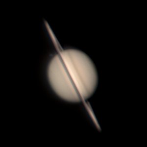 Saturn mit Rhea und Schattenwurf