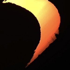 Untergang der teilverfinsterten Sonne