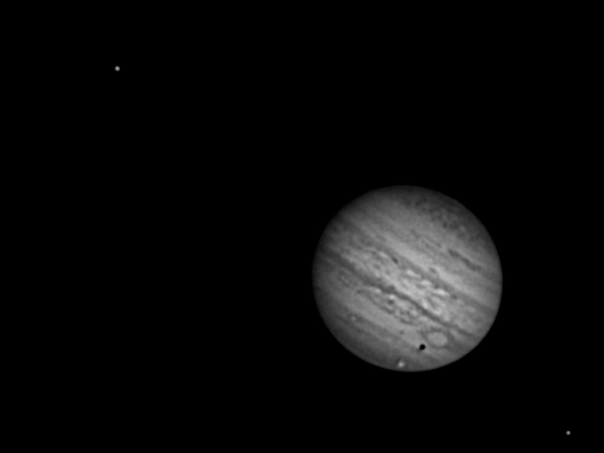 Ganymede vor Jupiter mit Schattenwurf