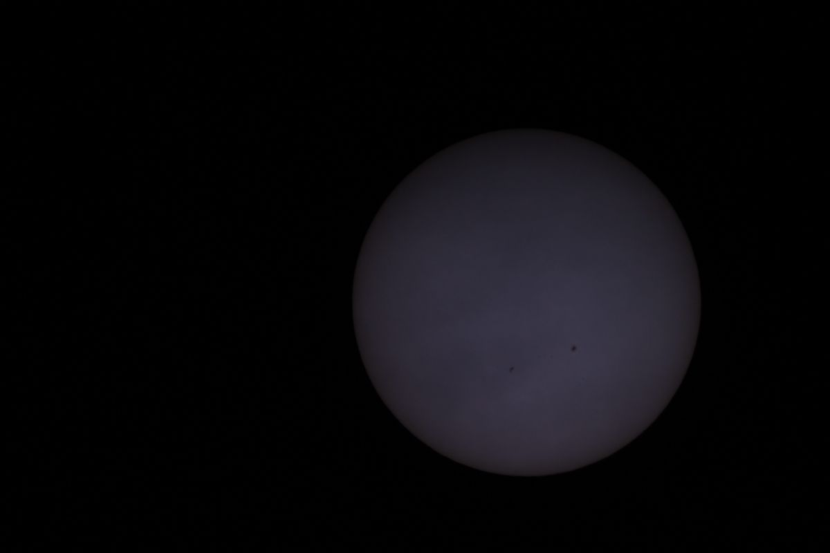 Sonne hinter Schleierwolken